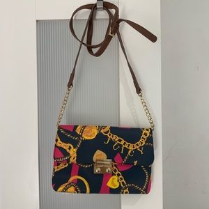 Juicy Couture cross body printed bag.